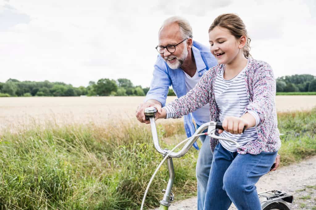 grandfather with child biking